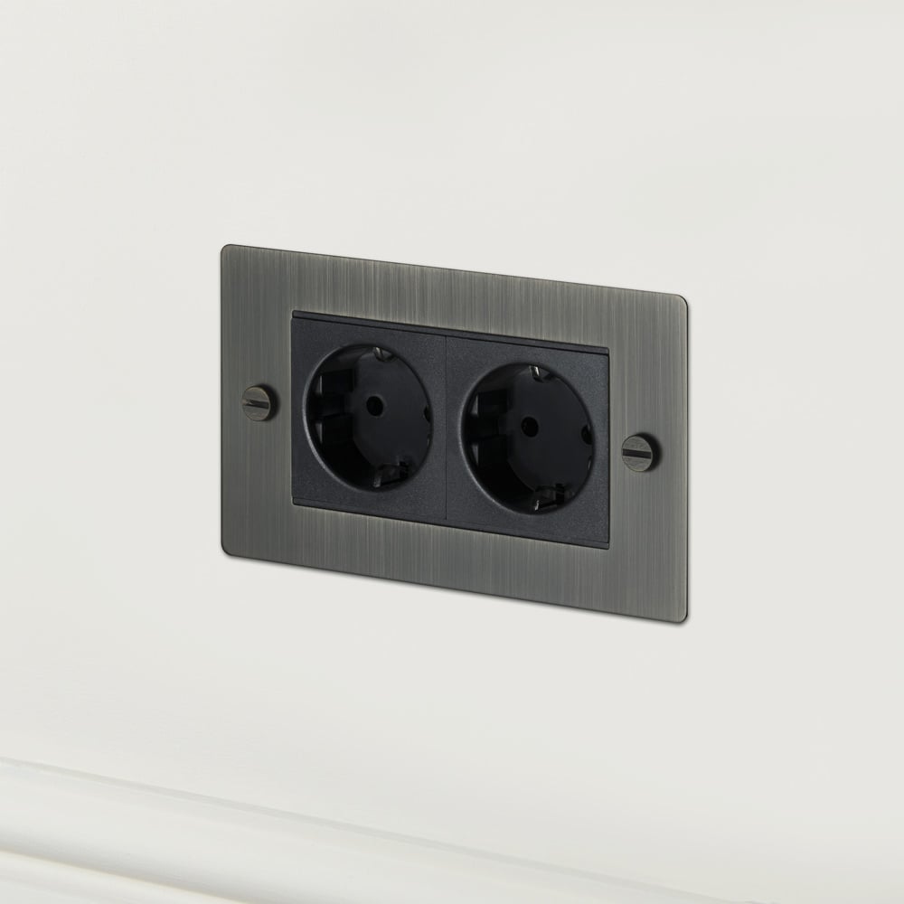 Buster + Punch UK - MG - CO - 2G - SM - A 2G Euro Socket Switch + Socket Smoked Brass - Araco Interiors