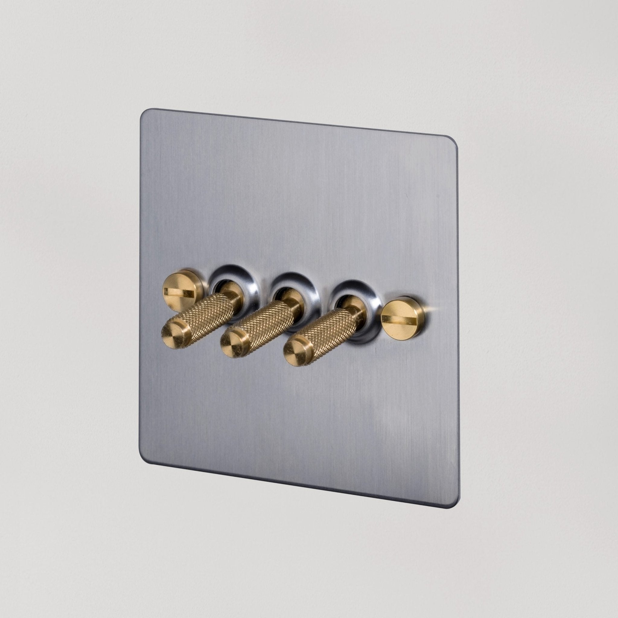 Buster + Punch UK - TO - CO - 3G - ST - BR - A 3G Toggle Switch Light Switch Steel - Brass - Araco Interiors