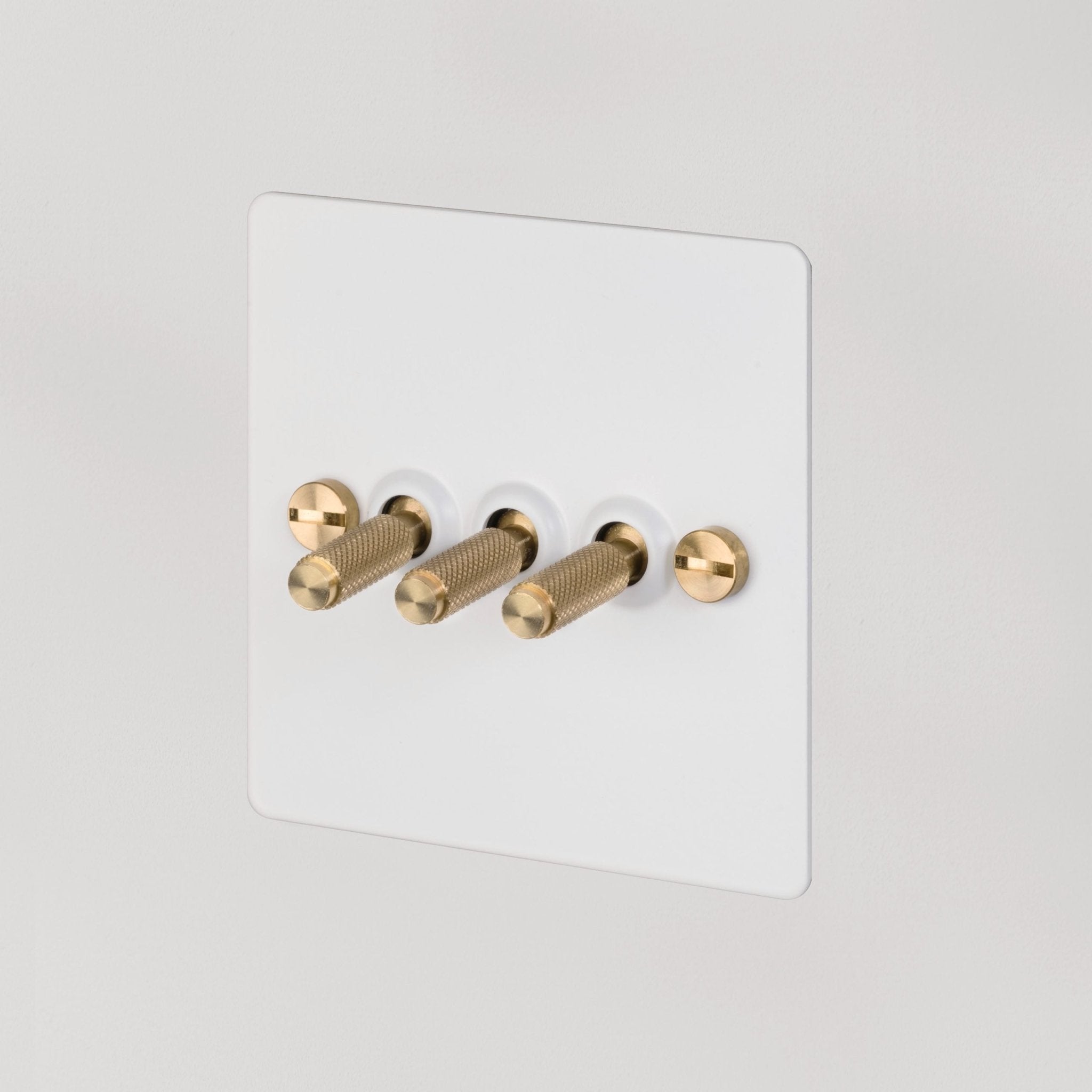 Buster + Punch UK - TO - CO - 3G - WH - BR - A 3G Toggle Switch Light Switch White - Brass - Araco Interiors