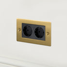 Buster + Punch UK - MG - CO - 2G - BR - A 2G Euro Socket Switch + Socket Brass - Araco Interiors
